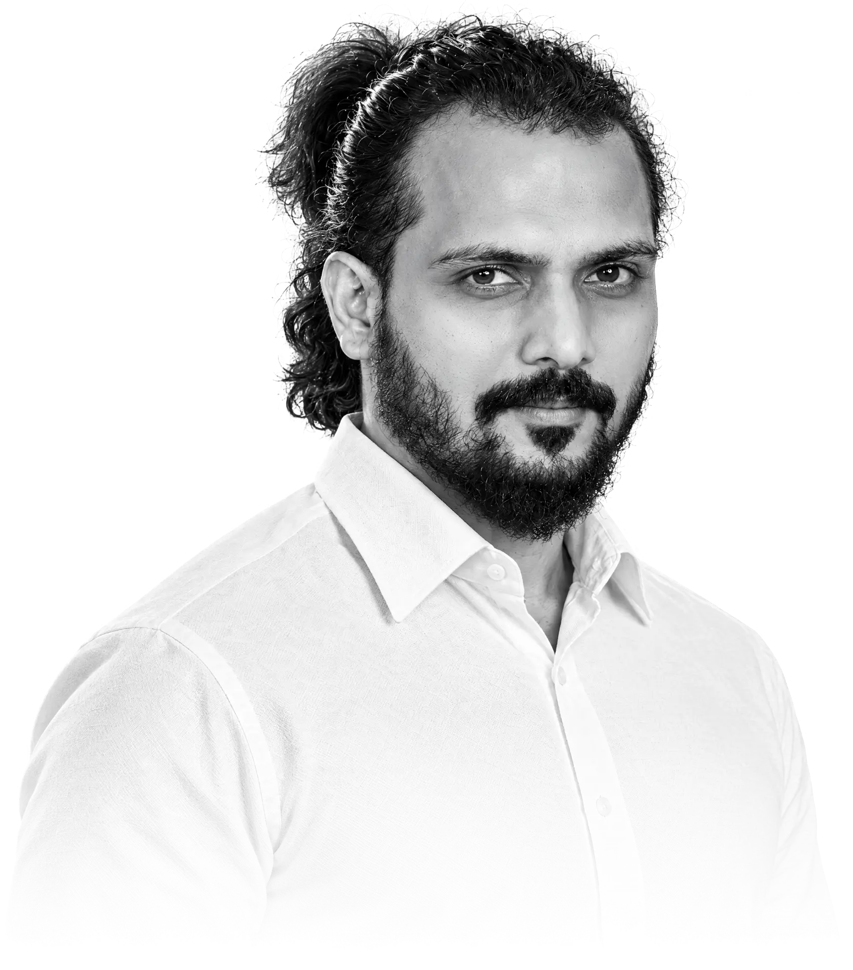 Black-and-white portrait of Pavan Jharang, multidisciplinary creative lead